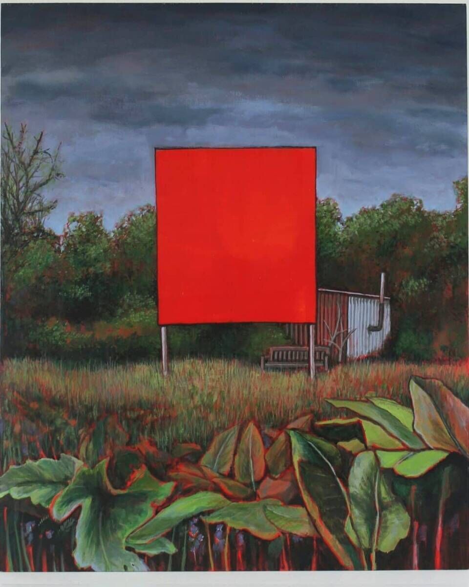 red billboard in nature